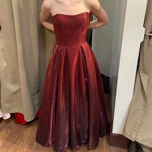 This is a size 4 dress that’s never been worn, tags still on it.